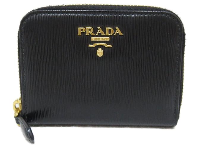 Portafoglio in pelle Prada con zip, astuccio per monete in pelle 1MM268 in ottime condizioni Nero  ref.1437633