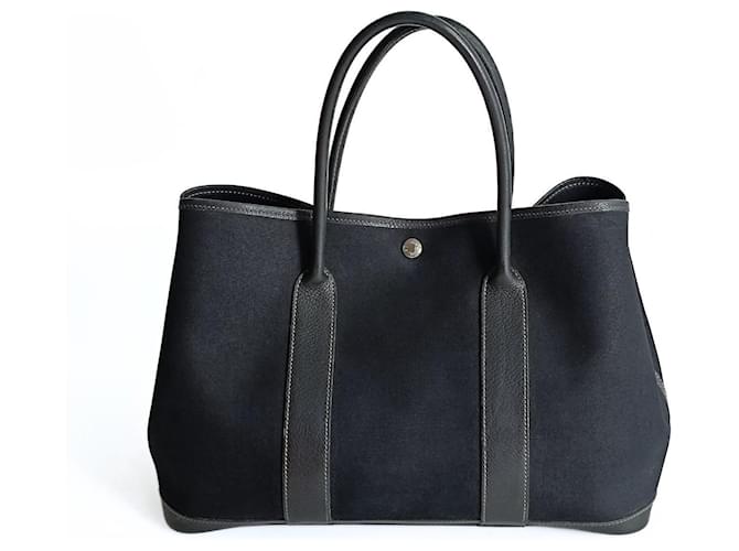 Hermès Garden Party handbag in black canvas and leather Cloth  ref.1439342