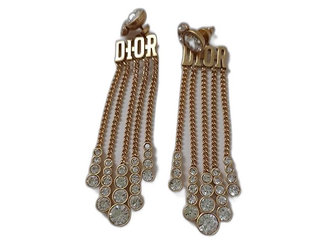 Orecchini Dior in metallo dorato e cristalli D'oro