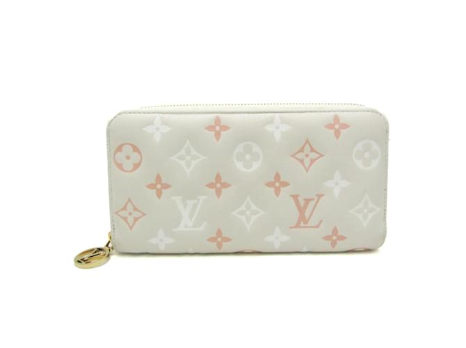 Cartera Zippy Louis Vuitton M82290 - Piel de cordero beige claro bi-fold para mujeres Cuero  ref.1446344