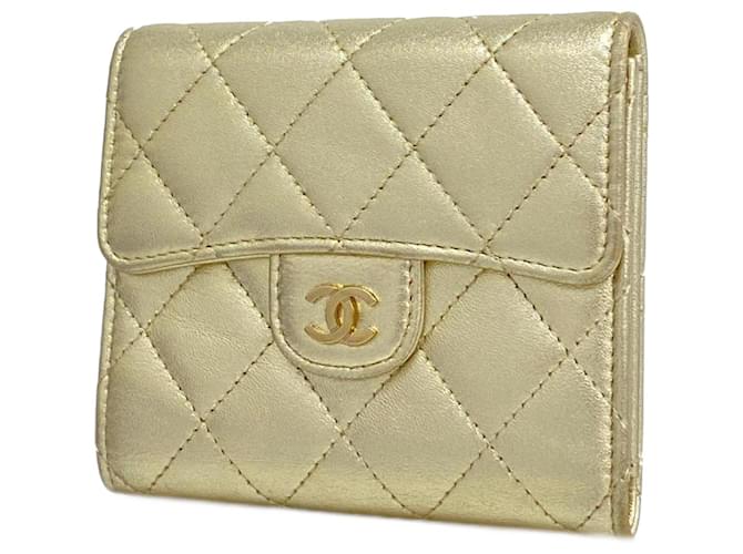 Timeless Chanel Gold Matelasse Leather Tri-fold Wallet for Women Golden  ref.1446427