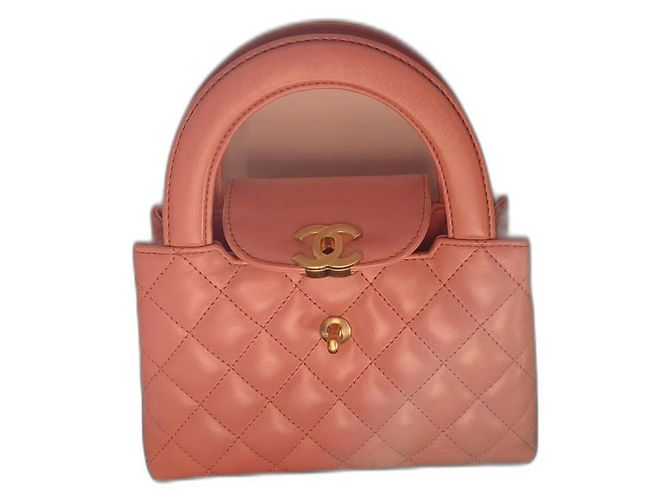 Girl Sac Chanel Kelly Nano Rose en Cuir
