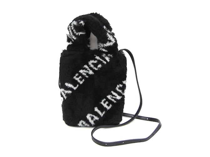 Borsa porta telefono EVERYD di Balenciaga Nero Bianco Pelle Pelliccia ecologica  ref.1452489