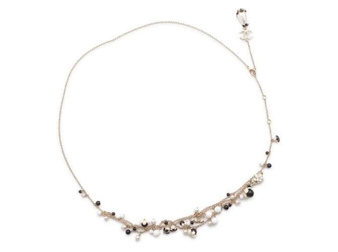 Collier Camélia Marque Coco de Chanel Métal Noir Blanc Doré  ref.1452597