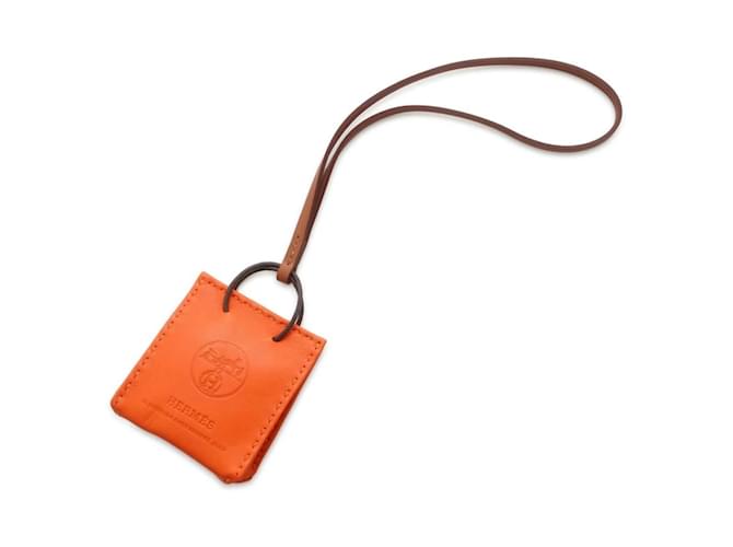 Hermès Porte-clés en cuir d'agneau Hermes Rouge Doré  ref.1452863