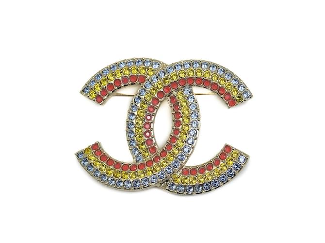 Broche Arc-en-ciel Coco Mark de Chanel Métal Bleu Doré Orange Jaune  ref.1454672