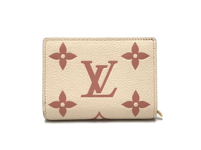 Portefeuille bi-fold Monogram Empreinte Louis Vuitton Beige  ref.1455629