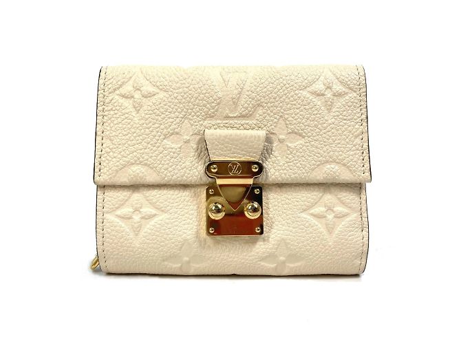 Cartera Metis Trifold Monogram Empreinte Louis Vuitton Beige