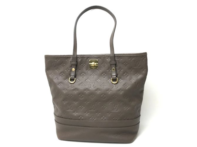 Bolso tote Ombre Brown Monogram Empreinte Louis Vuitton Castaño
