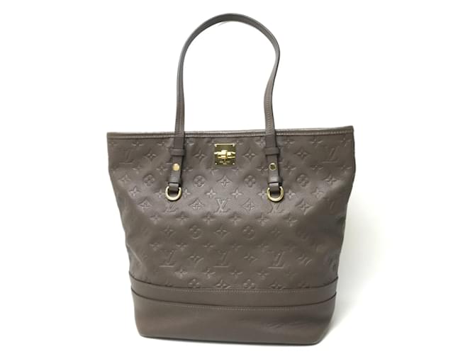 Bolsa tote Ombre Brown Monogram Empreinte Louis Vuitton Marrom  ref.1457083