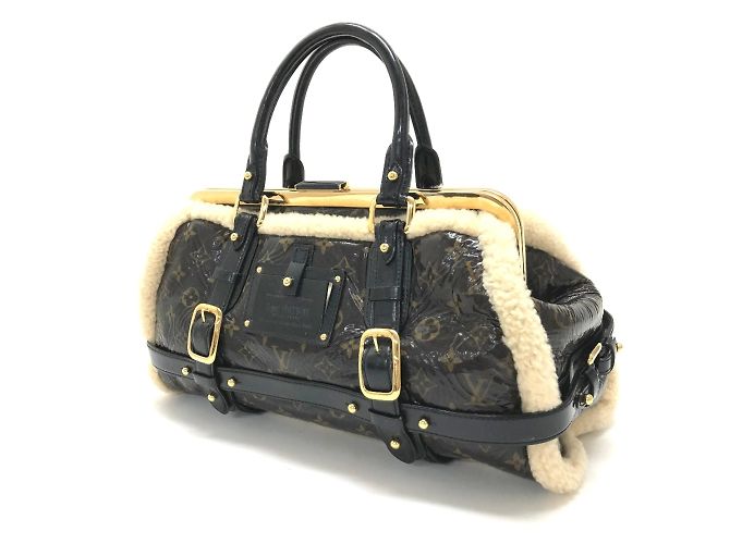 Borsa da viaggio Monogram in shearling Louis Vuitton Marrone