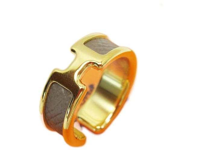 Hermès Hermes Scarf Ring in Brown and Gold Golden Leather Metal  ref.1459294