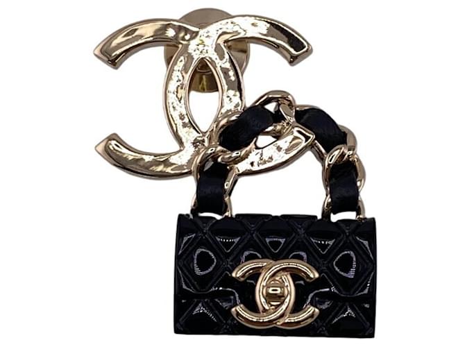 Broche Chanel Coco Mark B23C Matelassé con cierre giratorio Negro Chapado en oro  ref.1459467