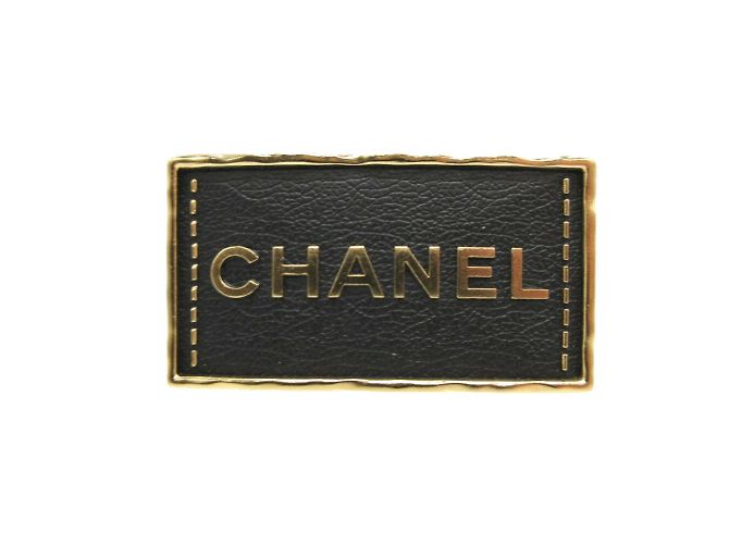 Broche de couro metal preto ouro Chanel A23S Dourado