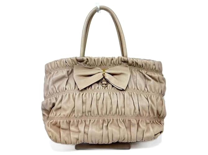 Ribbon Sac à main Prada en cuir nappa beige  ref.1464323