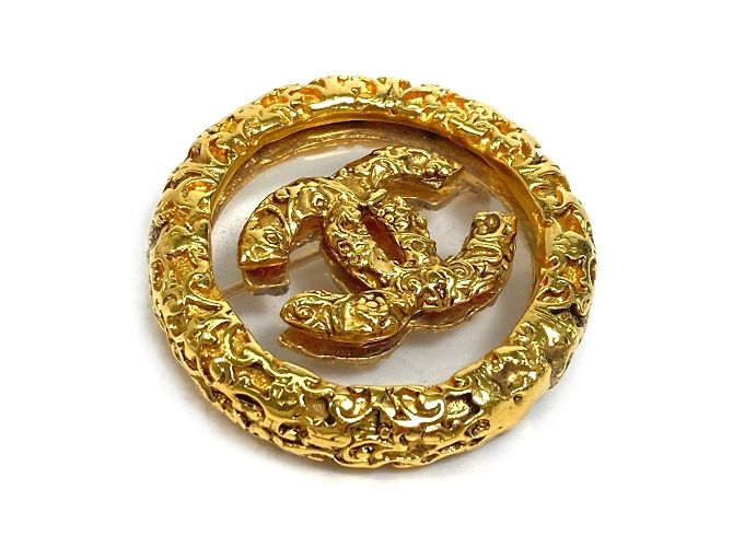 Broche circular de oro CC de Chanel Dorado