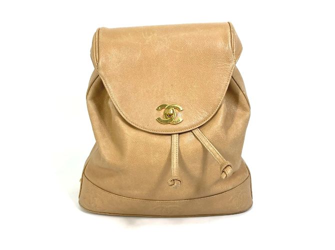 Mochila de couro bege vintage Chanel