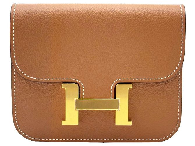 Monedero Constance de Hermès Castaño Dorado