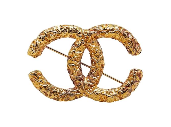 Broche Chanel Coco Mark Yougan Plaqué or Doré  ref.1469643