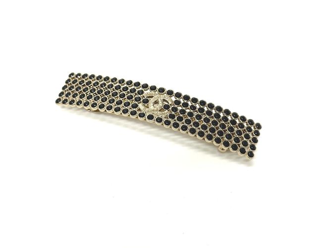 Accessorio per capelli logo Chanel Valletta oro Nero
