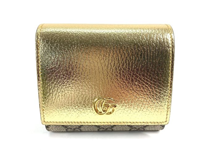 Gucci Bi-Fold Geldbörse in Gold Golden