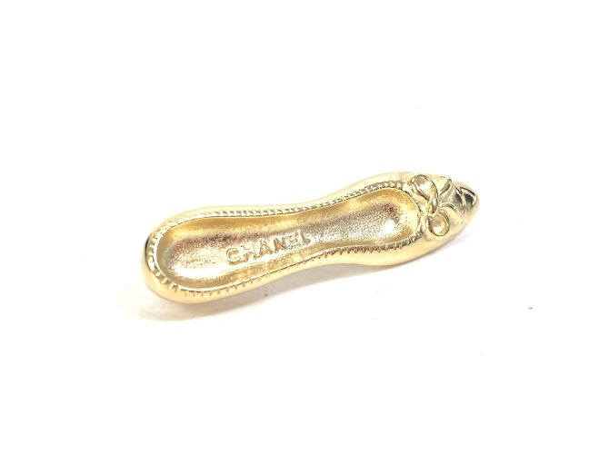 Broche banhada a ouro Chanel Dourado