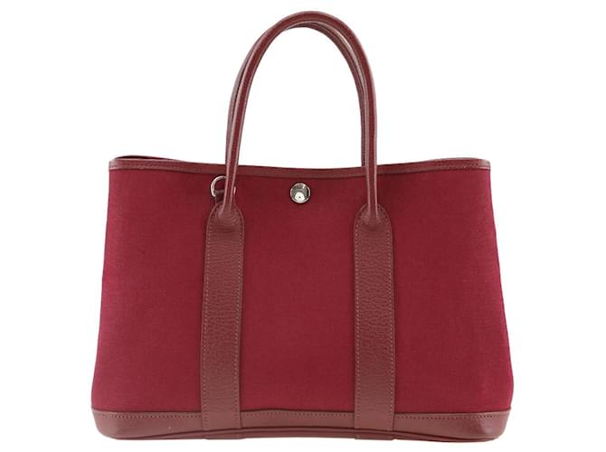 Hermès Sac bandoulière en toile Hermes Toile Garden Party TPM en très bon état Rouge  ref.1474413