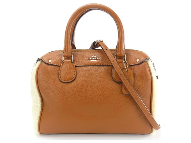 Coach Entrenador Camello Cuero  ref.1480357