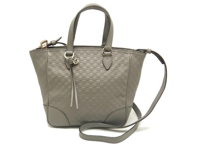 Sac à main en cuir Micro Guccissima de Gucci Marron  ref.1480464