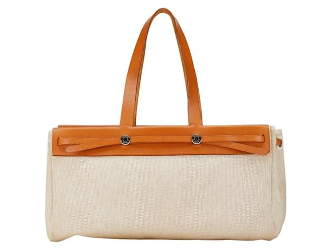 Hermès Bolsa tote Airbag GM Hermes Marrom Bege Couro Pano  ref.1484996