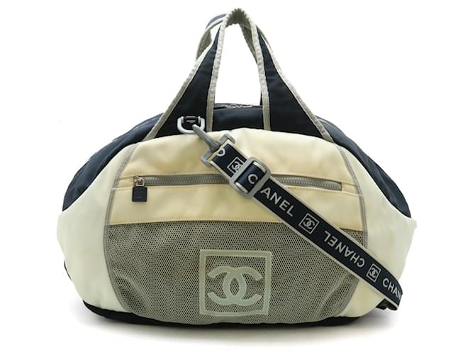 Chanel Sport Line Coco Mark Boston Tasche Braun WeiB Marineblau Leinwand ref.1486666 Joli Closet