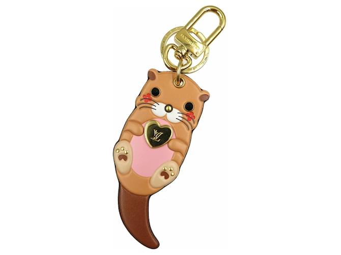 Louis Vuitton Porte Cle Otter Keychain Brown Monogram Patent leather Cloth Metal  ref.1488411