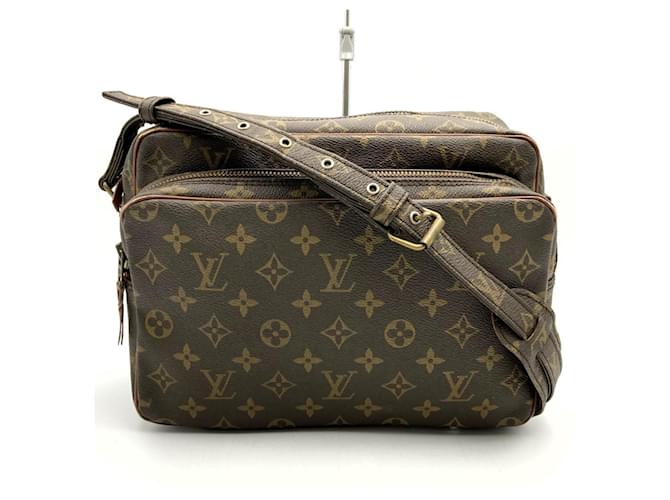 Migratour Schultertasche M45244 von Louis Vuitton Braun Lackleder  