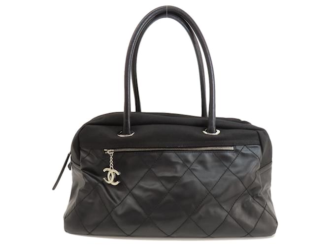 Bolsa tote Chanel Paris Biarritz Preto Couro Lona  ref.1492486