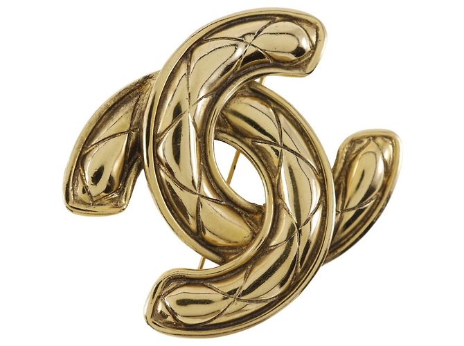 Spilla Coco Mark di Chanel D'oro