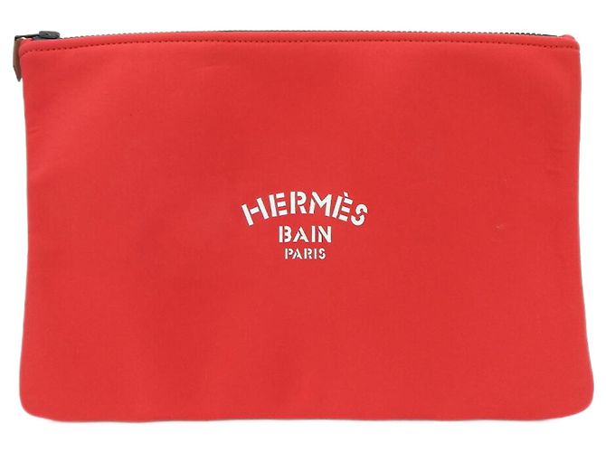Hermès Clutch in nylon rosso Hermes Kara