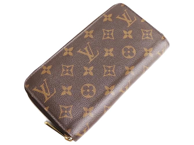 Porte-monnaie Monogram Louis Vuitton Cuir vernis Marron Rouge Monogramme  ref.1511350