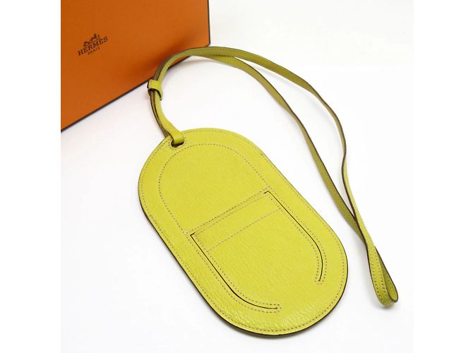Hermès Custodia per smartphone HERMES In The Loop To Go PM Chevre Mizol Jaune Naple