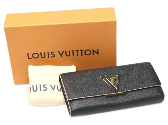 Capucines Cartera larga bifold de cuero Taurillon negro Louis Vuitton
