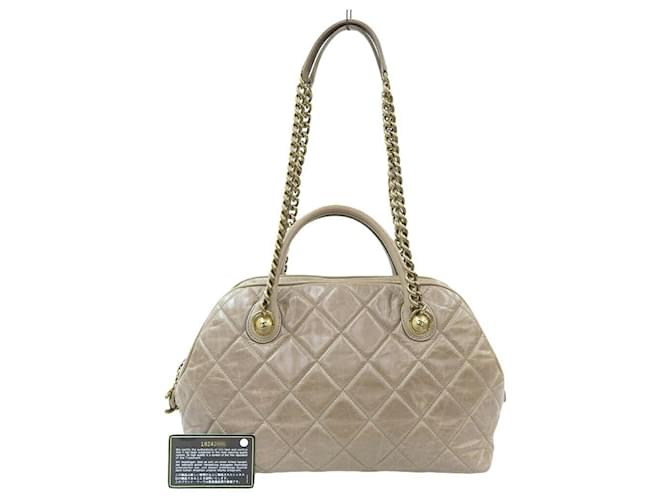 Sac à main en cuir Matelassé Chanel Marron  ref.1515488