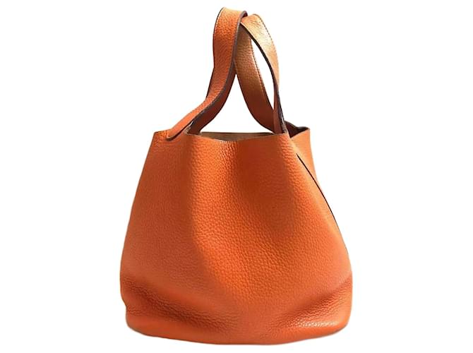 Hermès Bolsa Hermes Picotin Lock MM Laranja Couro  ref.1515694