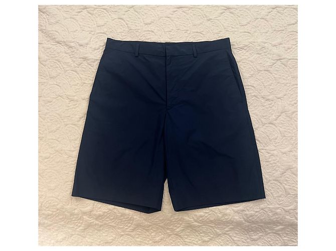 Prada Navy blue bermuda triangle logo patch shorts