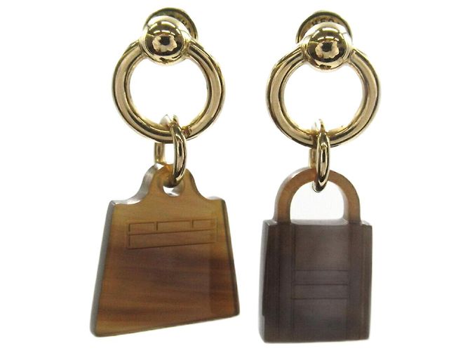 Hermès Hermes Amulett Kelly Cadena Ohrringe Braun Golden