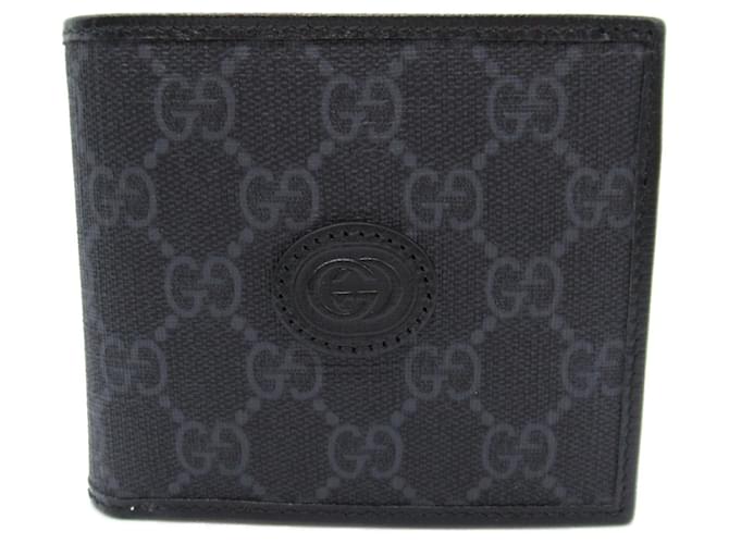 Portefeuille bi-fold Gucci en toile noire  ref.1525496