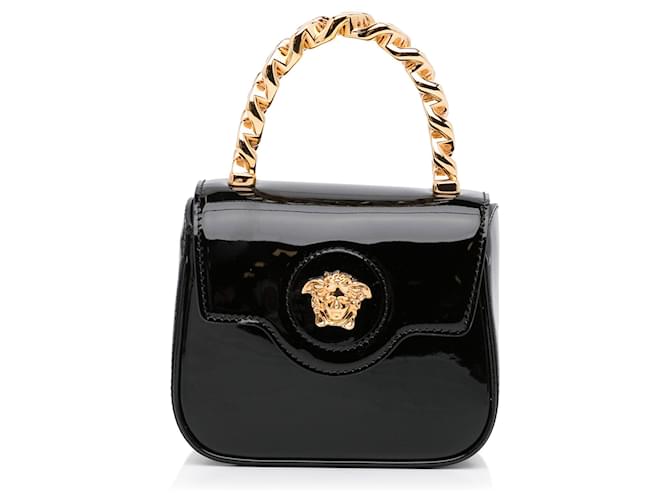 Bolsas de mão VERSACE em couro Preto  ref.1533510