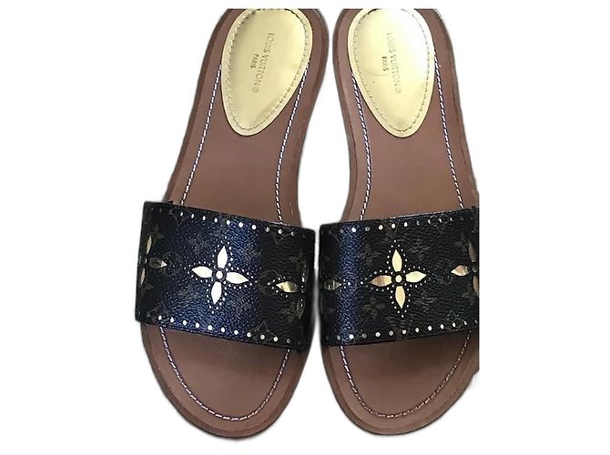 Louis Vuitton Mules planas Lock It Marrom Dourado