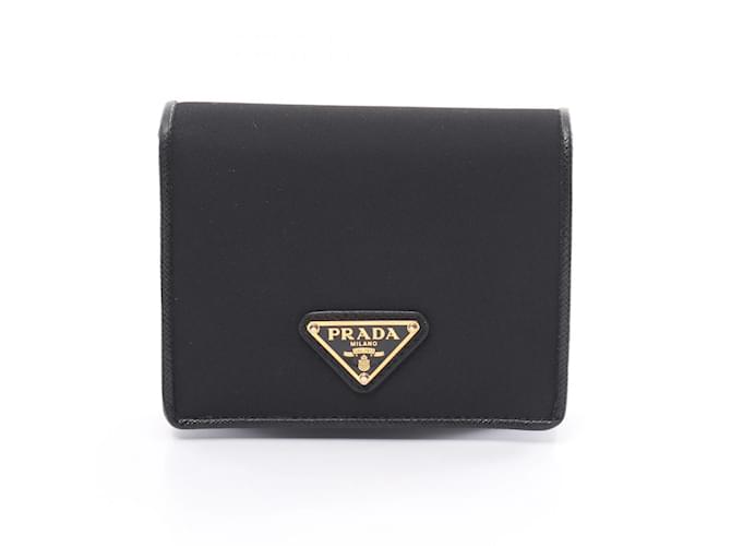 Saffiano Prada Bi-Fold Geldbörse in Schwarz Leder Nylon  ref.1535128