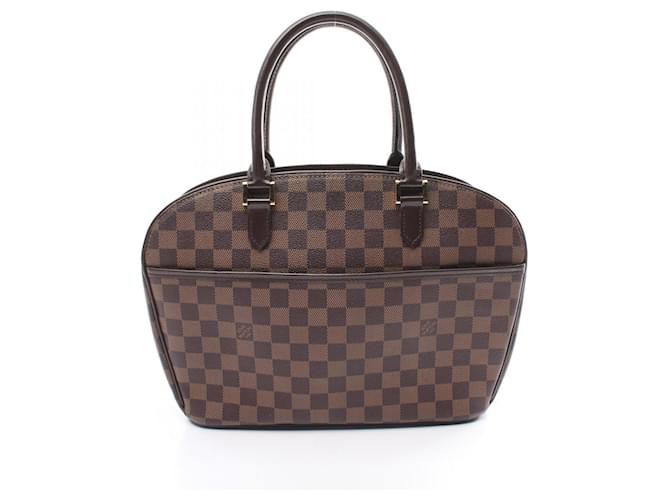 Bolsa Louis Vuitton Saria Horizontal Damier Ebene Marrom Couro Lona  ref.1535855