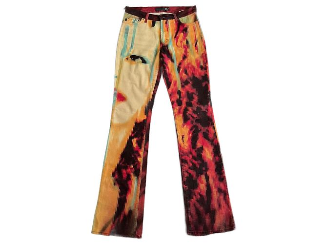 Línea Roberto Cavalli "Just" Primavera Verano 2001 Jeans con Estampado de Cara Pixel. Multicolor