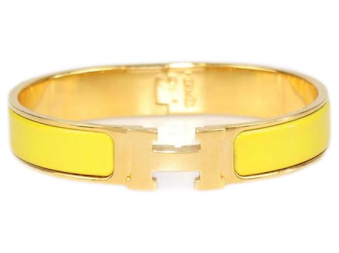 Hermès Pulsera Clic Clac H en tono plateado con esmalte amarillo y verde de Hermes Acero  ref.1553462